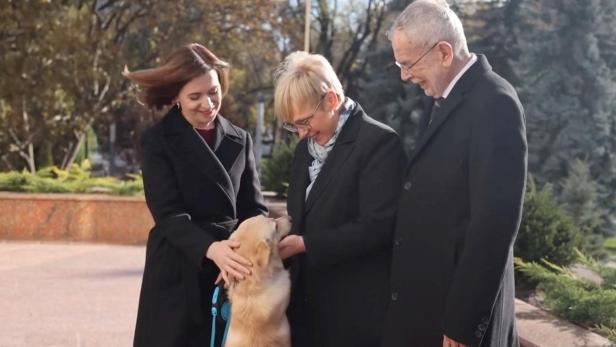 Moldova's President Sandu and her dog greet Austria's President Van der Bellen and Slovenia's President Pirc Musar in Chisinau