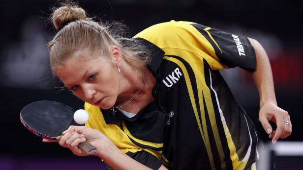 Tetyana Bilenko of Ukraine hits a return to Feng Tianwei of Singapore in their women&#039;s singles fourth round match at the World Team Table Tennis Championships in Paris May 17, 2013. The 52nd edition of the World Table Tennis Championships gathers 829 athletes from 162 countries and runs from May 13 to May 20. REUTERS/Charles Platiau (FRANCE - Tags: SPORT TABLE TENNIS)