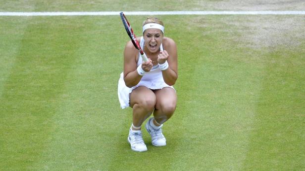 Sabine Lisicki of Germany celebrates after defeating Kaia Kanepi of Estonia in their women&#039;s quarter-final tennis match at the Wimbledon Tennis Championships, in London July 2, 2013. REUTERS/Toby Melville (BRITAIN - Tags: SPORT TENNIS TPX IMAGES OF THE DAY)