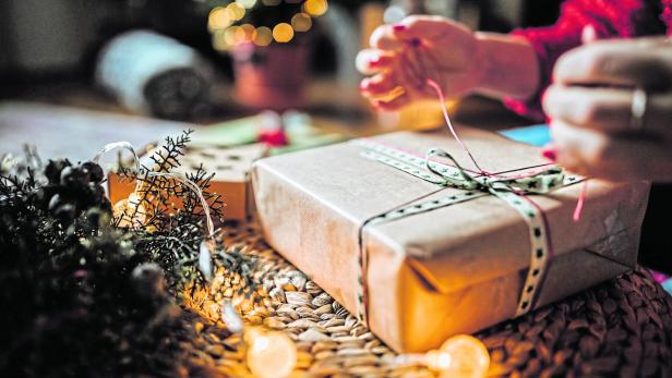 Woman Wrapping Christmas Gifts