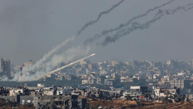Rockets are launched from the Gaza Strip into Israel, after a temporary truce expired between Israel and the Palestinian Islamist group Hamas, as seen from Israel's border with Gaza in southern Israel