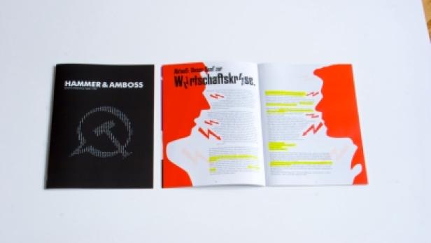 Ein aufgeschlagenes Magazin von „Hammer & Amboss“ zum Thema Wirtschaftskrise.