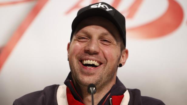 Austrian skier Mario Scheiber laughs during a news conference in Schladming, March 12, 2012. Scheiber announced on Monday that he will retire from professional competition. REUTERS/Lisi Niesner (AUSTRIA - Tags: SPORT SKIING)