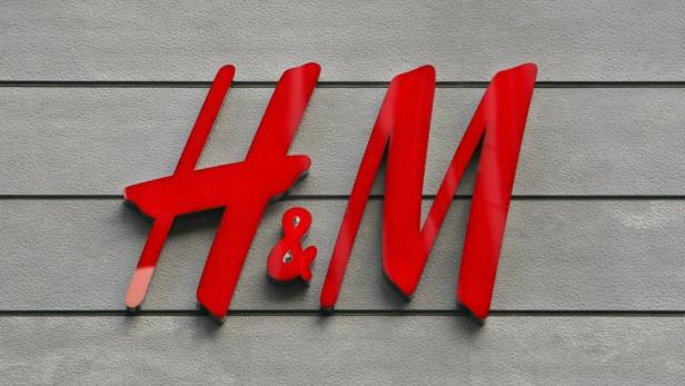 epa01487744 A corporate logo of the H&amp;M is seen at the company&#039;s shop in Tokyo&#039;s upscale Ginza shopping district, Japan, 14 September 2008. Swedish fashion retailer giant Hennes and Mauritz (H&amp;M) opened its first store in Japan on 13 September, making the competition in the Japanese fashion industry even fiercer than what it already is now. More than 2,000 shoppers queued at the store on Sunday to get their hands on the Stockholm-based company&#039;s affordable yet fashionable products. H&amp;M plans to open two more stores in Tokyo&#039;s leading fashion districts of Shibuya and Harajuku. EPA/DAI KUROKAWA