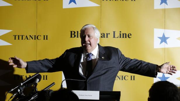 Australian billionaire Clive Palmer speaks at a news conference to announce his plan to build Titanic II, a modern replica of the doomed ocean liner, at the Ritz in central London March 2, 2013. The ship will largely recreate the design and decor of the fabled original, with some modifications to keep it in line with current safety rules and shipbuilding practices, and the addition of some modern comforts such as air conditioning, Palmer said at a news conference in New York earlier. REUTERS/Olivia Harris (BRITAIN - Tags: TRAVEL BUSINESS SOCIETY)