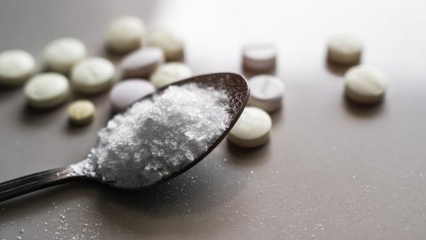 Amphetamine on Spoon with blur Pill and Overlight Background