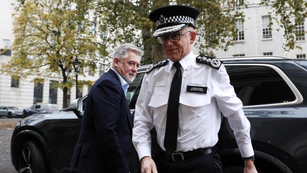 British Police Commissioner Rowley faces pressure after protesters climb war memorial