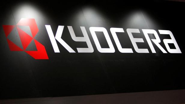 FILE PHOTO: A logo of Kyocera Corp. is seen at Wireless Japan 2012 in Tokyo