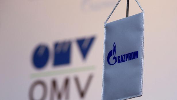 FILE PHOTO: The logos of Austrian oil and gas group OMV and Gazprom are seen in Vienna