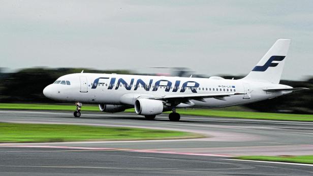 FILE PHOTO: FILE PHOTO: A Finnair Airbus A320 aircraft prepares to take off from Manchester Airport in Manchester