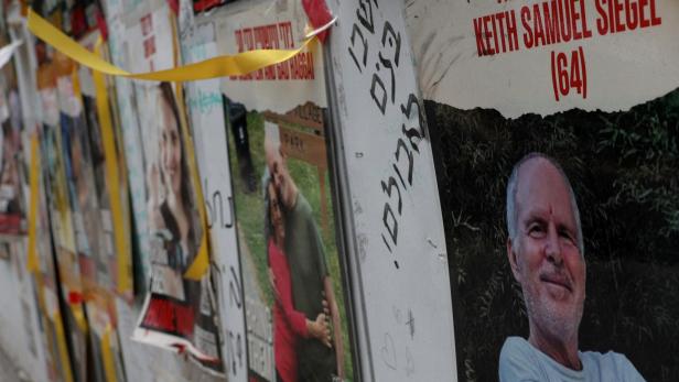 A view of a banner depicting Keith Siegel, who is a dual U.S. citizen seized during the October 7 attack on Israel and taken hostage into Gaza in Tel Aviv, Israel