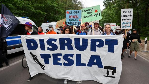 Activists protest against the expansion of the Tesla Gigafactory in Gruenheide