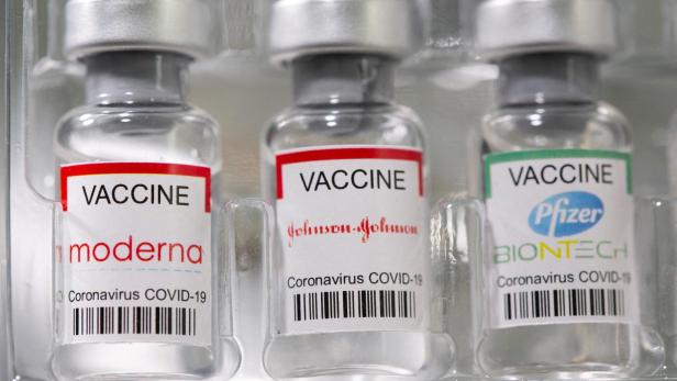 FILE PHOTO: Vials labelled "Moderna, Johnson&Johnson, Pfizer - Biontech coronavirus disease (COVID-19) vaccine" are seen in this illustration picture
