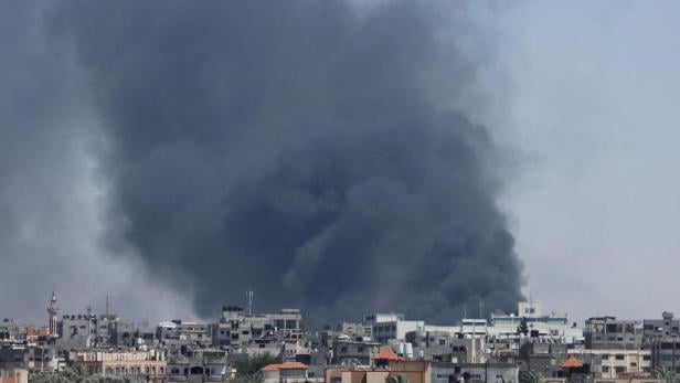 Smoke rises during an Israeli air strike, in Rafah