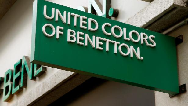 FILE PHOTO: The logo of Italian fashion group Benetton is seen at a store in Zurich