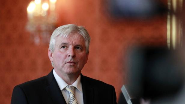 Jiri Rusnok attends a news conference after being appointed by Czech President Milos Zeman as new prime minister at Prague Castle June 25, 2013. Rusnok will replace Petr Necas who resigned last week in a bribery and spying scandal involving a close aide. REUTERS/Petr Josek (CZECH REPUBLIC - Tags: POLITICS)