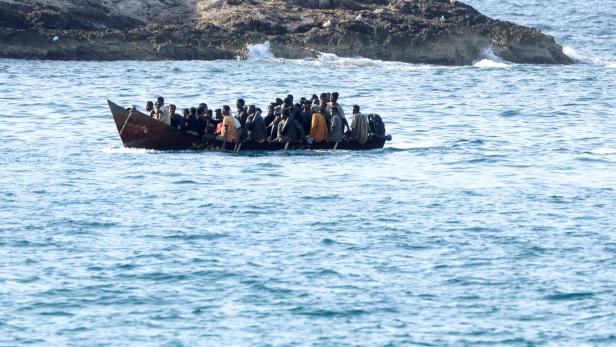 FILE PHOTO: Migrants on Lampedusa