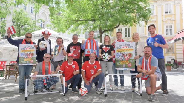 Fußball und Olympia schauen in der Stadt