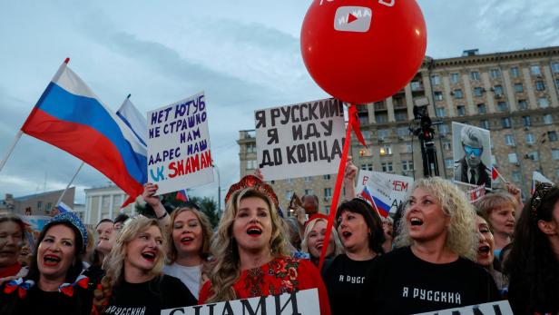 Spectators gather before a concert held in protest against blocking of Russian users' channels on YouTube, in Moscow