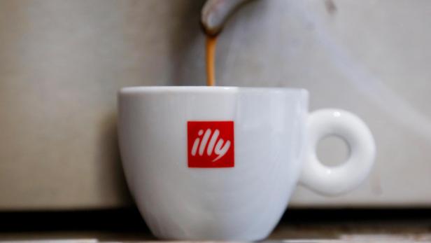 FILE PHOTO: Coffee flows into a Illy cup at a coffee shop in Rome