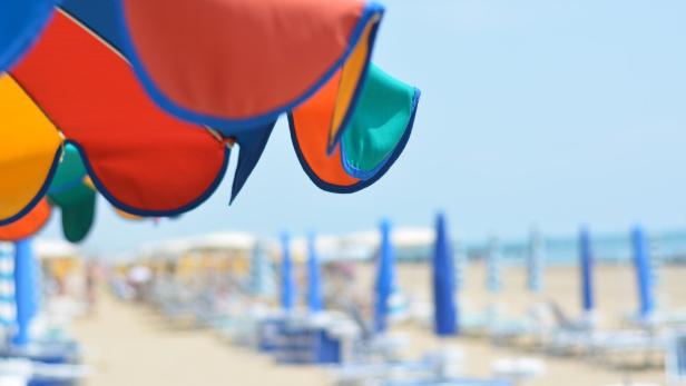 a colorful beach umbrella a colorful beach umbrella