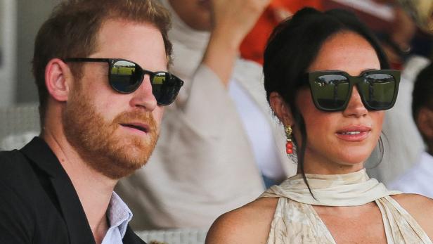 FILE PHOTO: Britain's Prince Harry and Meghan visit Nigeria