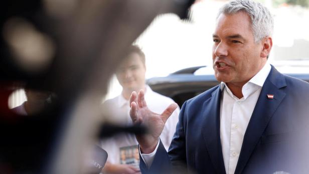 Austrian Chancellor and head of Peoples Party Karl Nehammer addresses the media in Vienna