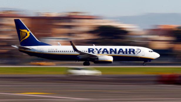 FILE PHOTO: A Ryanair aircraft lands at Ciampino Airport in Rome