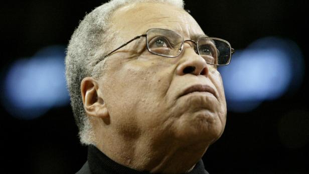 FILE PHOTO: Film star and corporate spokesman James Earl Jones reads the Star Spangled Banner before the start o..