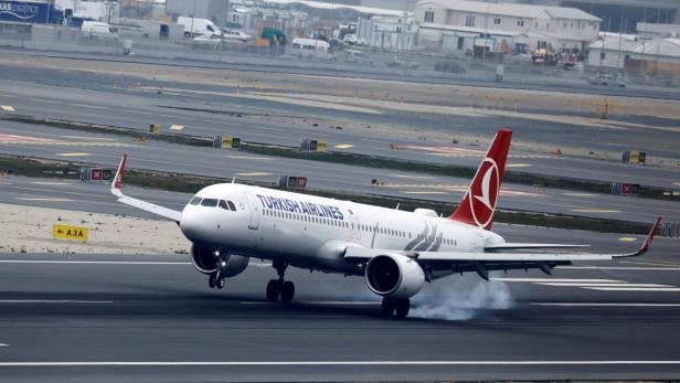 FILE PHOTO: A Turkish Airlines Airbus A321neo plane lands at the city's new Istanbul Airport in Istanbul