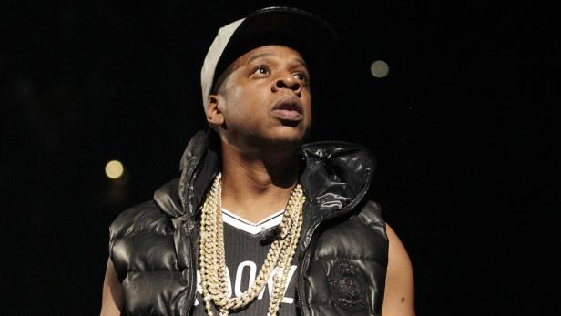 Entertainer Jay-Z performs on stage at the newly built Barclays Center in the Brooklyn borough of New York September 28, 2012. This is the first event at the new stadium. REUTERS/Carlo Allegri (UNITED STATES - Tags: ENTERTAINMENT PROFILE)