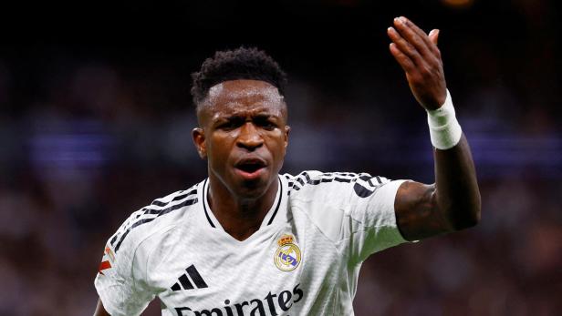 FILE PHOTO: Real Madrid's Vinicius Junior reacts during the LaLiga match against FC Barcelona