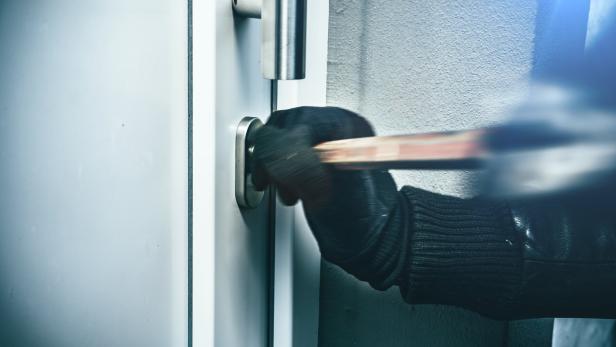 masked burglars breaking and entering into a victim's home