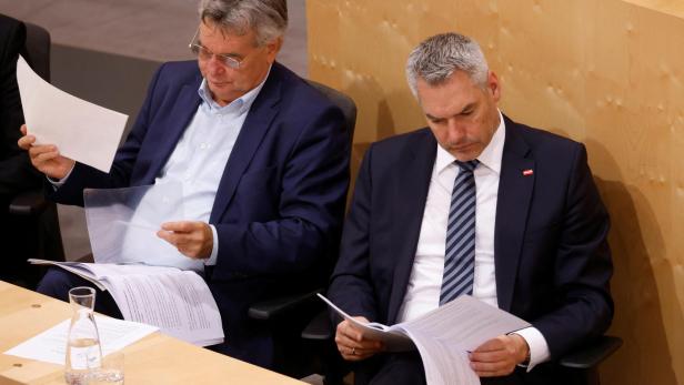 Austrian Chancellor Nehammer and Vice Chancellor Kogler attend the budget session of the Parliament in Vienna