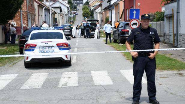 Police secure a crime scene in Daruvar