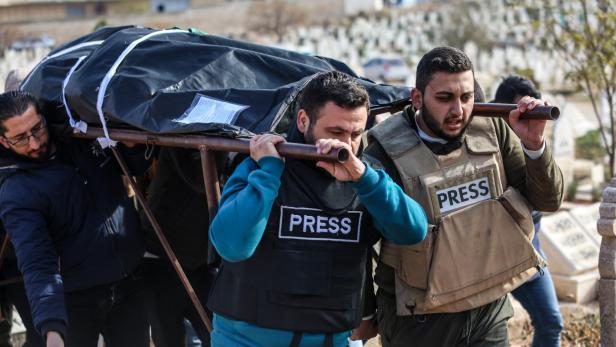 Funeral of Syrian photojournalist Anas al-Kharboutl in Idlib