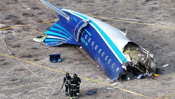 A drone view shows the crash site of a passenger plane near Aktau