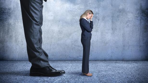 Businesswoman Feeling The Stress Of Workplace Discrimination