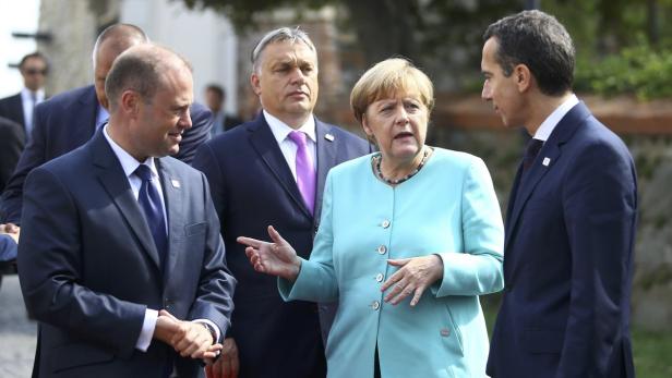 Zuletzt traf man einander vor einer Woche in Bratislava: Orban, Merkel und Kern, diesmal Gastgeber.
