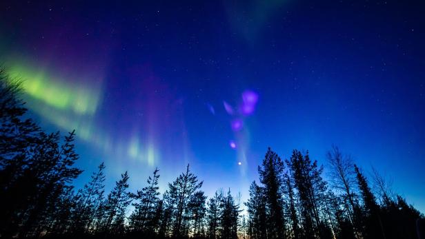 FINLAND-NATURE-AURORAS Weltglücksbericht: Hier leben die glücklichsten Menschen der Welt