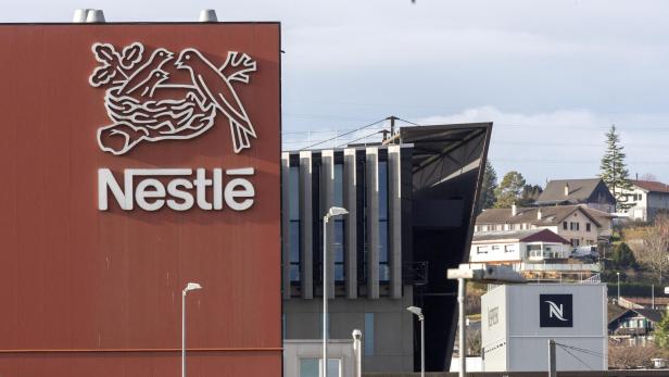 FILE PHOTO: A logo of food giant Nestle is seen in a building in Orbe FILE PHOTO: A logo of food giant Nestle is seen in a building in Orbe