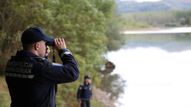 FILE PHOTO: Border police inspects Drina River, aiming to stop illegal border crossing in Zvornik FILE PHOTO: Border police inspects Drina River, aiming to stop illegal border crossing in Zvornik