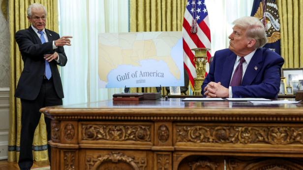 FILE PHOTO: U.S. President Donald Trump signs executive orders for reciprocal tariffs in Washington