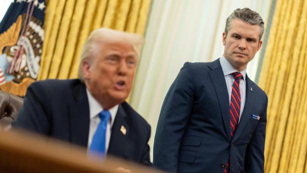 U.S. Defense Secretary Pete Hegseth speaks next to President Donald Trump, in the Oval Office at the White House, in Washington, D.C. U.S. Defense Secretary Pete Hegseth speaks next to President Donald Trump, in the Oval Office at the White House, in Washington, D.C.