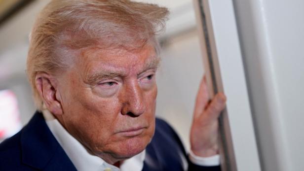 U.S. President Donald Trump on board Air Force One on the way to Palm Beach International Airport Donald Trump