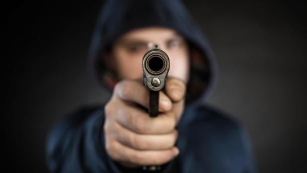 killer with gun