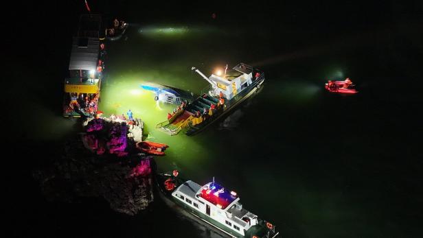 Dozens rescued after two passenger boats capsize in southwest China's Guizhou province Dozens rescued after two passenger boats capsize in southwest China's Guizhou province