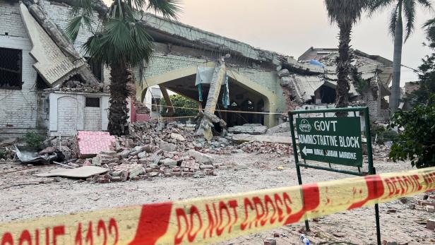 A damaged portion of an administration block at the Government Health and Education complex, after it was hit by an Indian strike, in Muridke