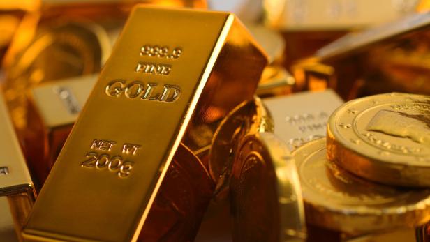 Gold coins with gold ingot Gold coins with gold ingot