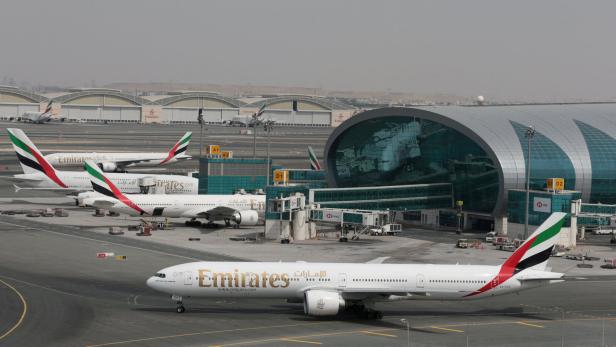 FILE PHOTO: Emirates Airline planes are seen at Dubai International Airport in Dubai